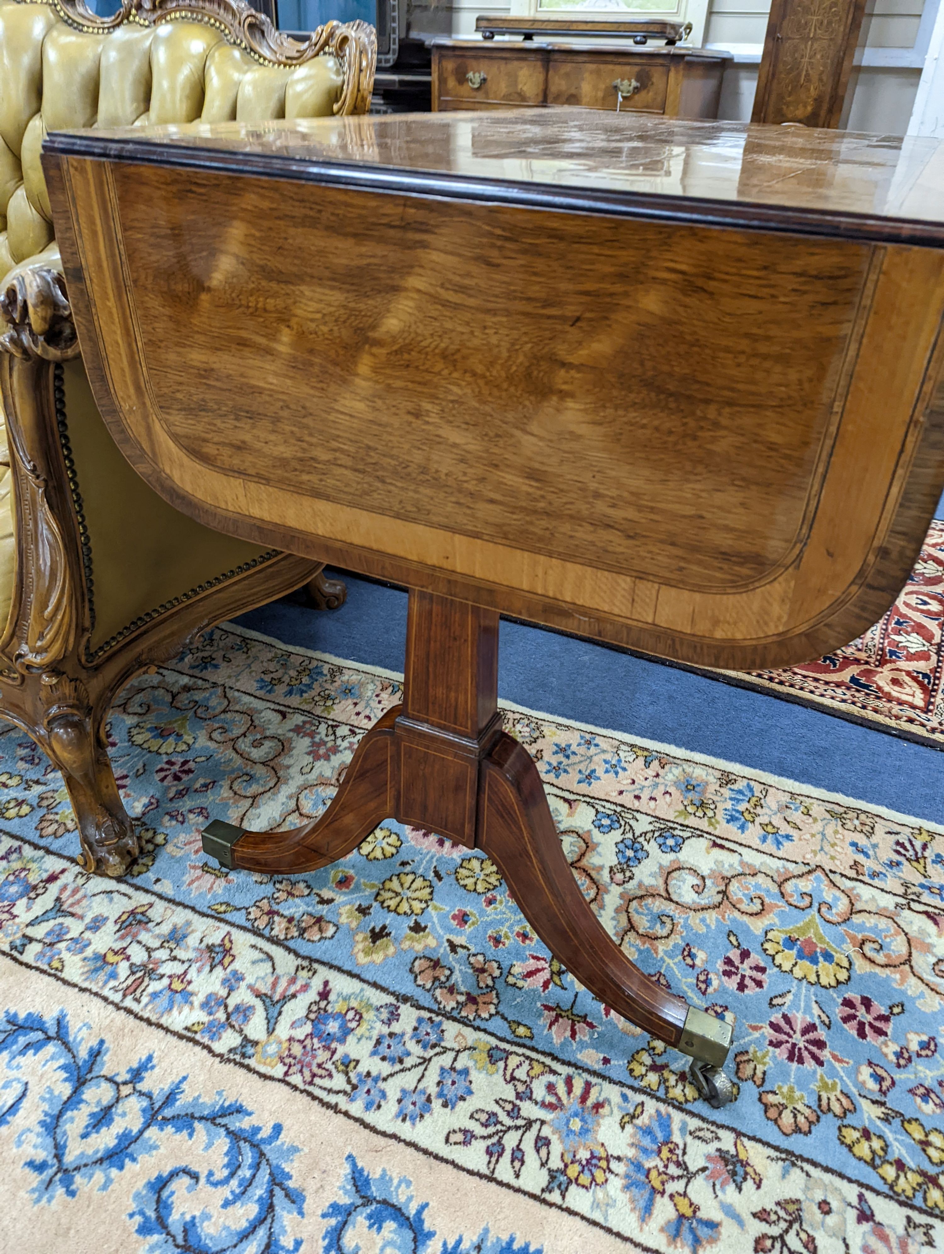 A Regency satinwood banded rosewood sofa table, width 101cm, depth 60cm, height 74cm